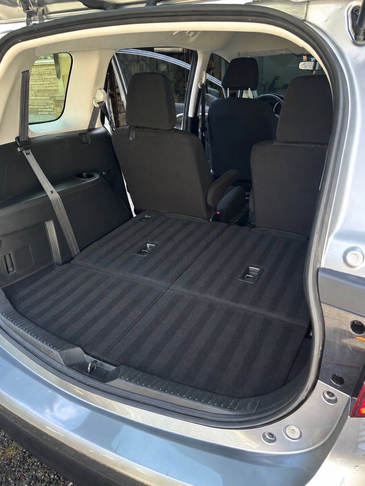SUV interior with folded rear seats and clean cargo area